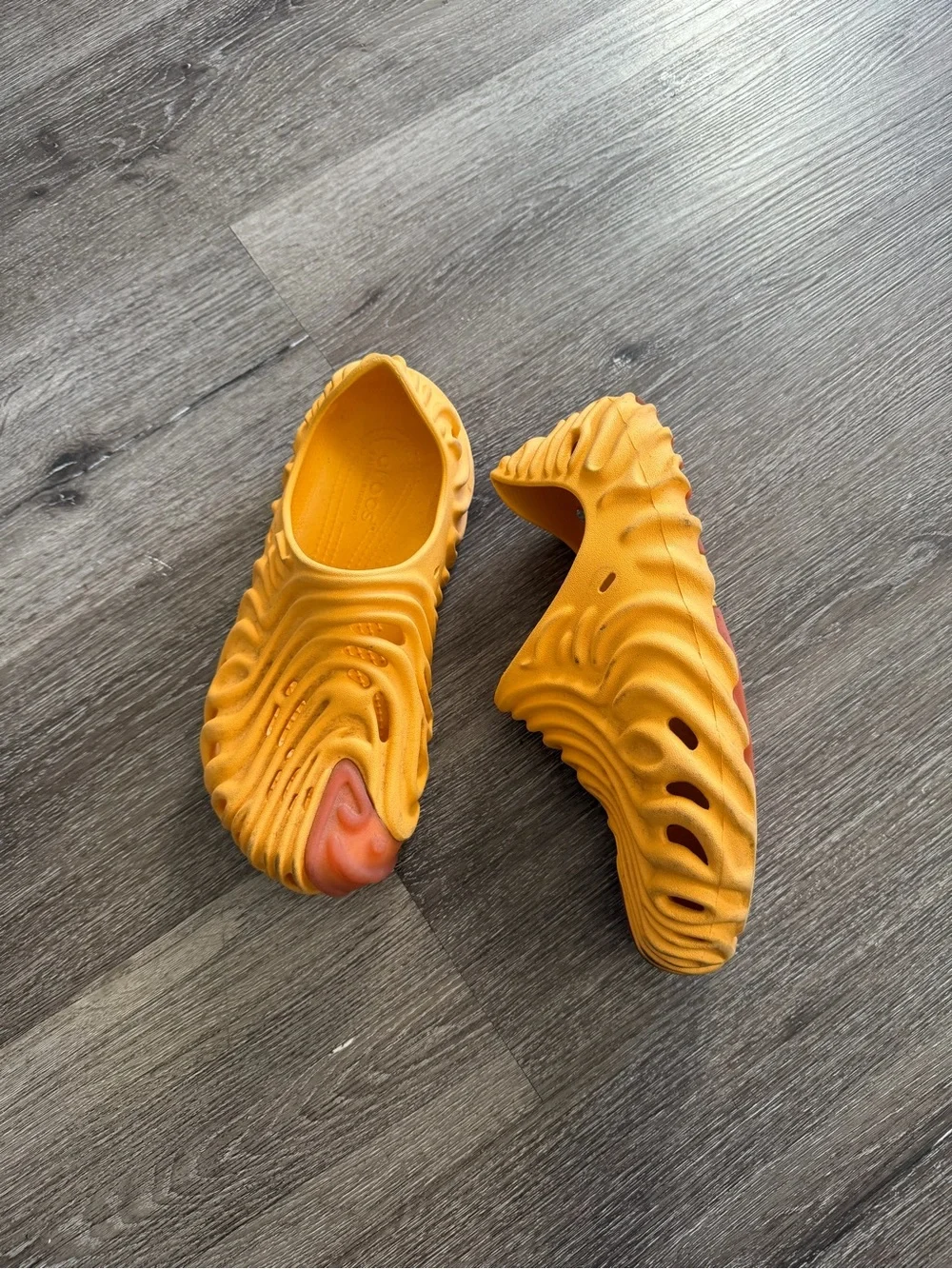 CROCS Men's Wave-Textured Slip-On Sandals in Orange with Red Accent